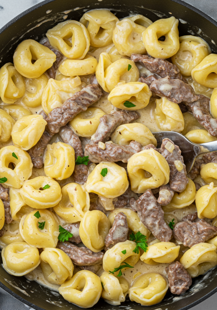 Philly Cheesesteak Tortellini with Creamy Provolone Sauce