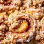 Peach Cobbler Cinnamon Rolls with Crumb Topping